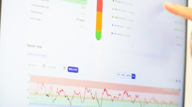 Clinician reviewing patient data on a tablet — context for the Insights articles
